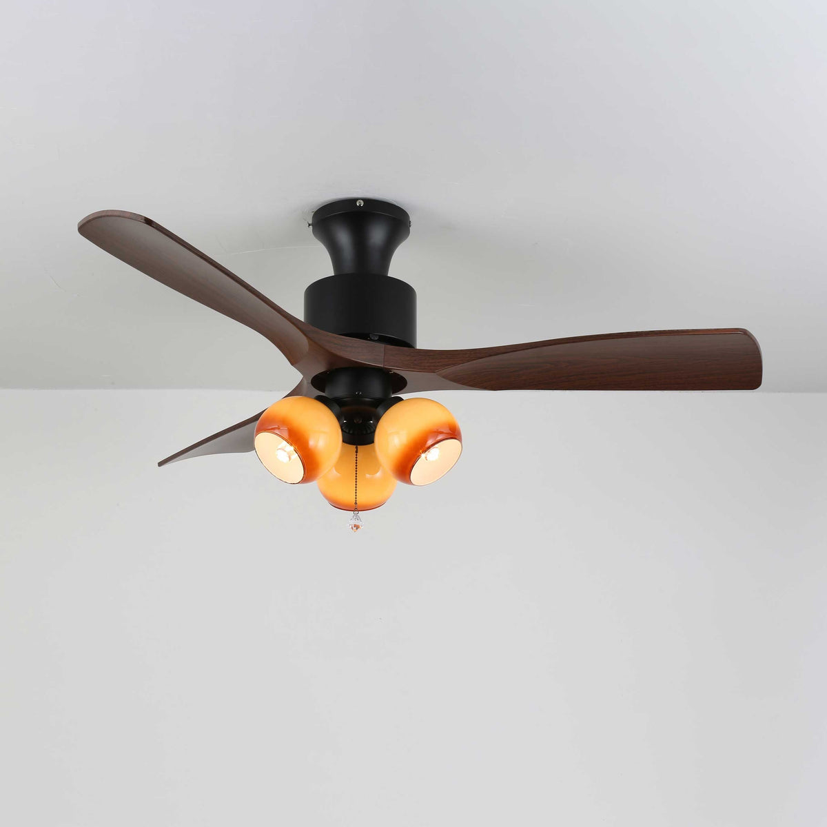 Lumo Orb Ceiling Fan Light with Amber Glass Globes and Walnut Blades