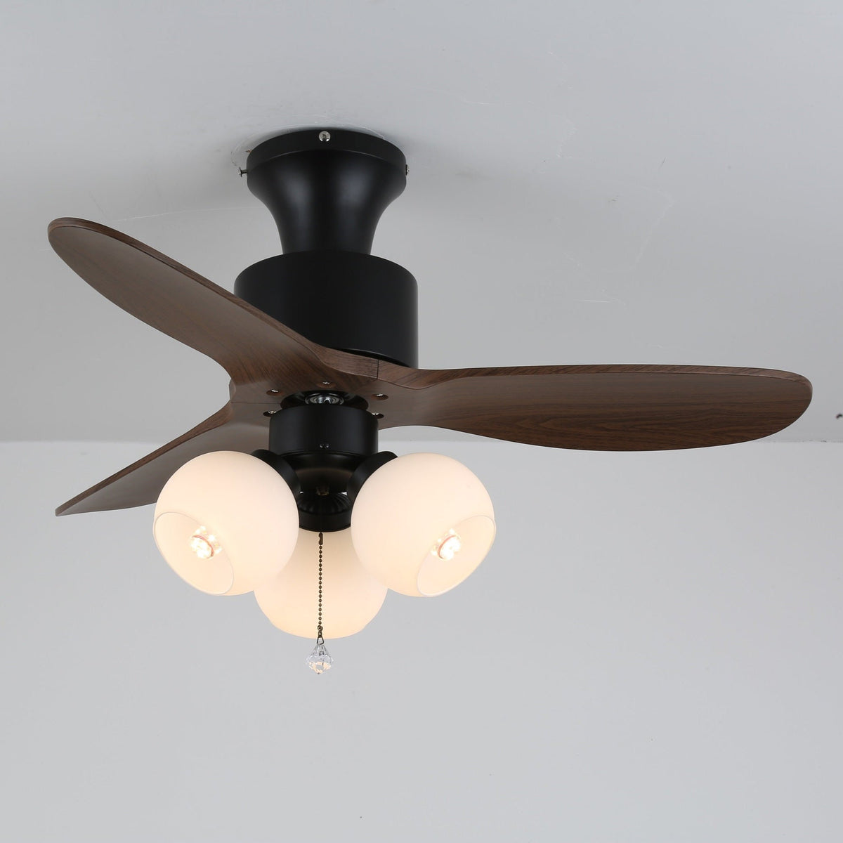 Lumo Orb Ceiling Fan Light with Amber Glass Globes and Walnut Blades