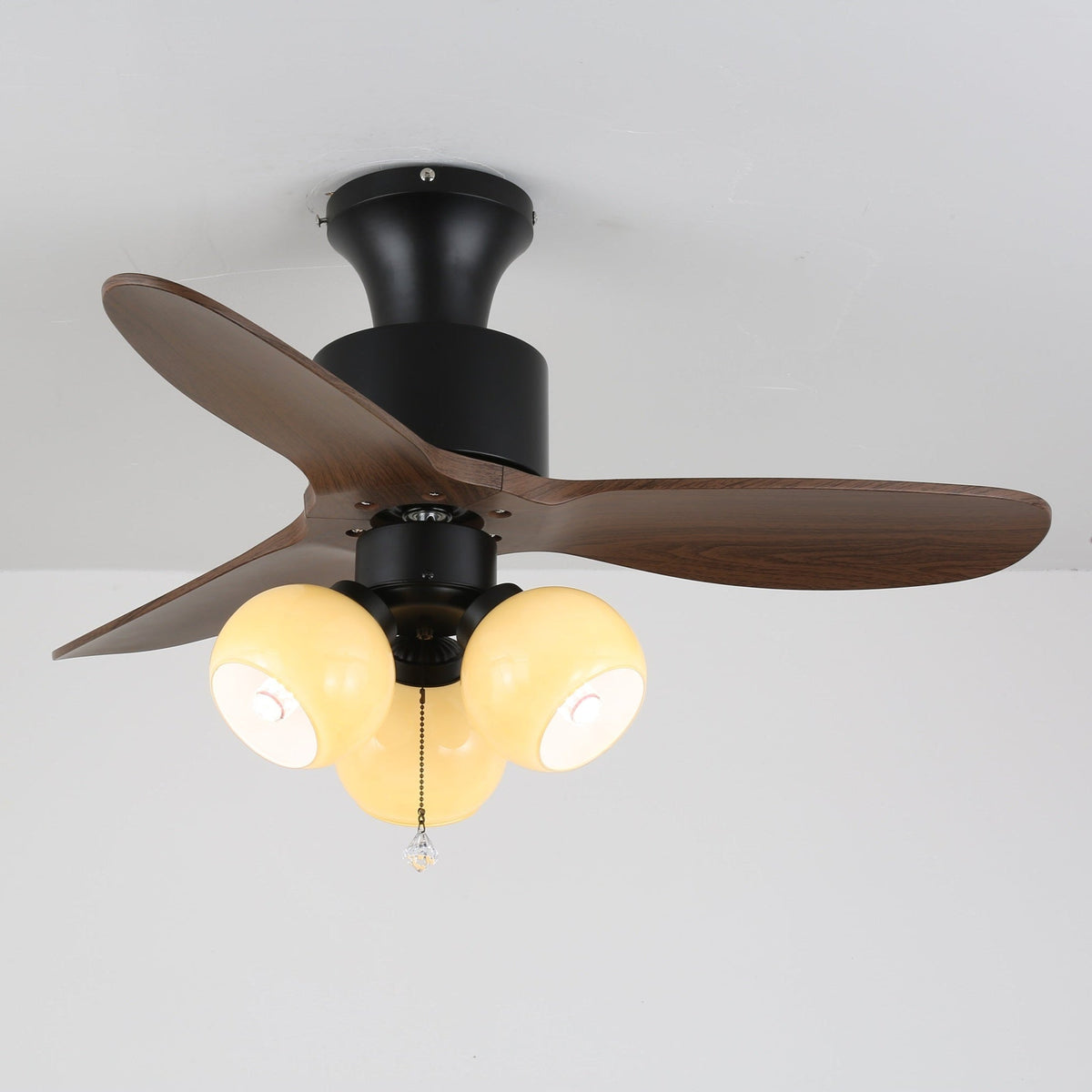 Lumo Orb Ceiling Fan Light with Amber Glass Globes and Walnut Blades