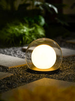 Luna Dome Outdoor Table Lamp – Minimalist Sphere with Protective Glow