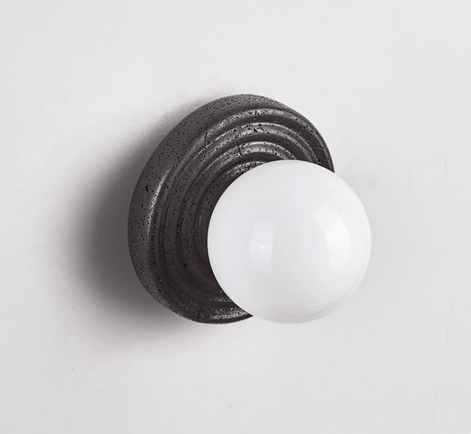 Lunara Black Travertine Wall Sconce with Opal Glass Globe