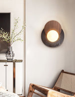 Lunar Embrace Wall Sconce — Black Travertine & Walnut with Opal Glass Globe
