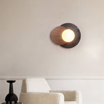 Lunar Embrace Wall Sconce — Black Travertine & Walnut with Opal Glass Globe
