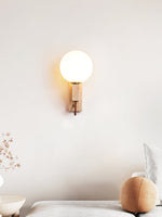 Lunar Travertine Wall Sconce with Opal Glass Globe