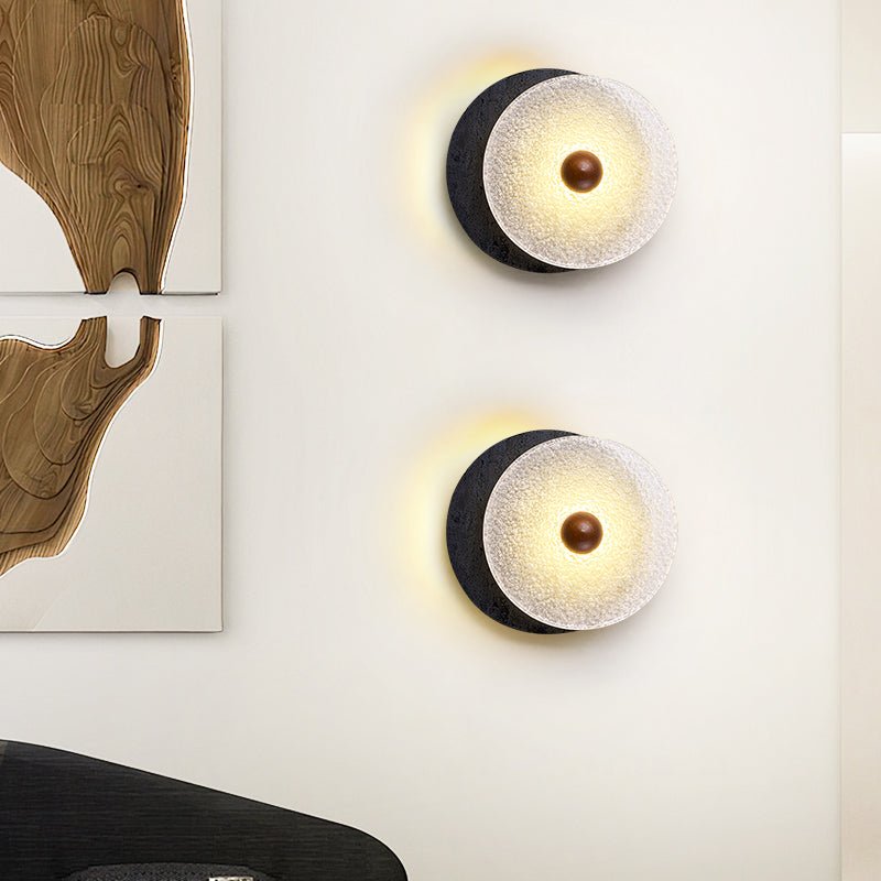 Lunara Textured Disc Wall Sconce in Black Travertine and Frosted Glass