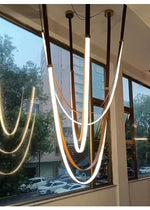 Lunestra Strap Chandelier — Sculptural LED Pendant Light in Leather and Brass