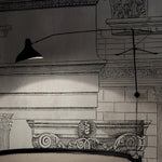 mantis-arm-wall-lamp