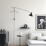mantis-arm-wall-lamp