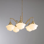 Marquette Modern Gold Chandelier with Frosted Glass Globes and Wood Accents