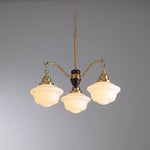 Marquette Modern Gold Chandelier with Frosted Glass Globes and Wood Accents