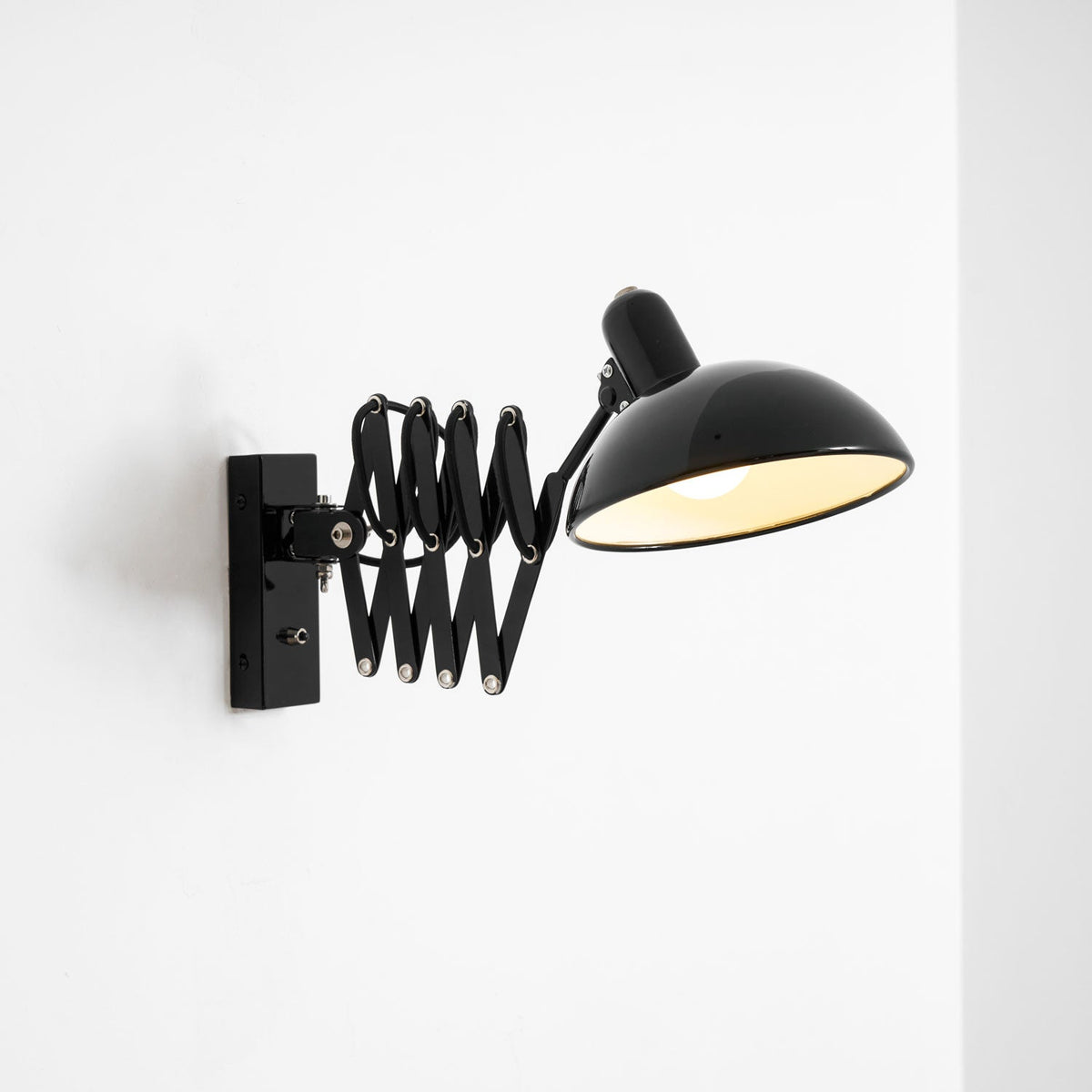 Maxon Adjustable Spring Wall Sconce in Glossy Black