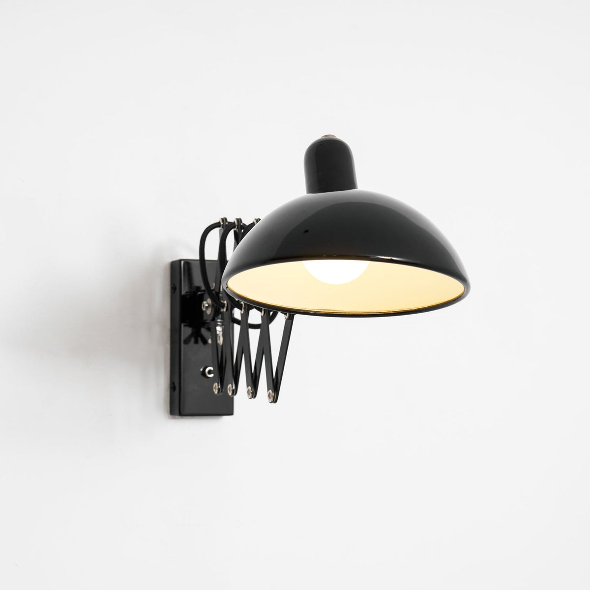 Maxon Adjustable Spring Wall Sconce in Glossy Black