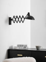 Maxon Adjustable Spring Wall Sconce in Glossy Black
