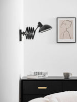 Maxon Adjustable Spring Wall Sconce in Glossy Black
