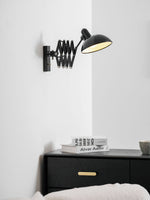 Maxon Adjustable Spring Wall Sconce in Glossy Black