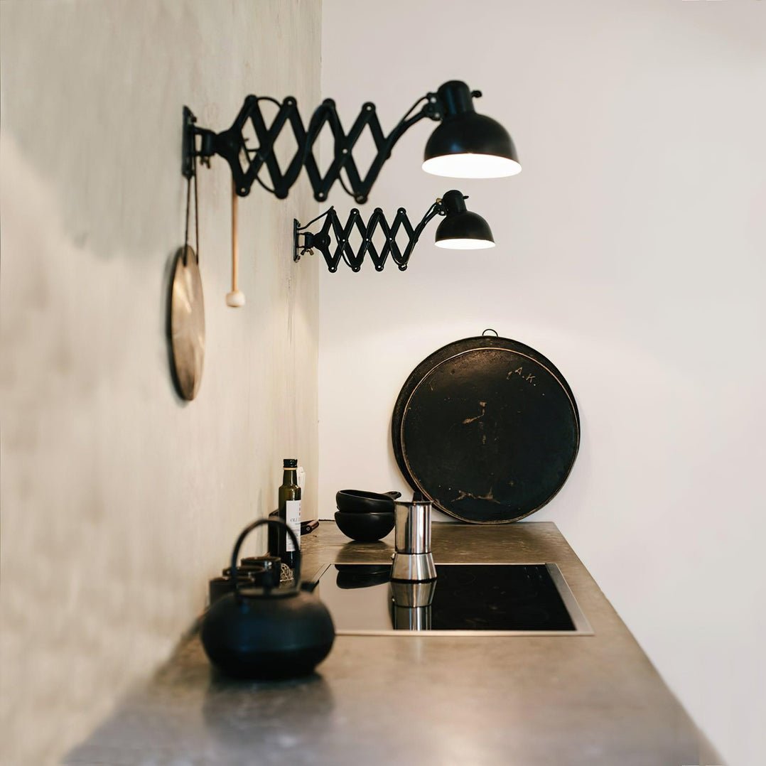 Maxon Adjustable Swing Arm Wall Sconce in Glossy Black for Modern Interiors