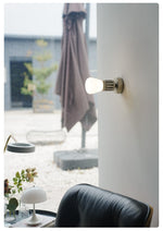 Adjustable Wall Sconce with Integrated LED for Reading and Ambient Light