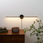 Linear LED Plug-In Wall Sconce with Metal Body and Warm Glow
