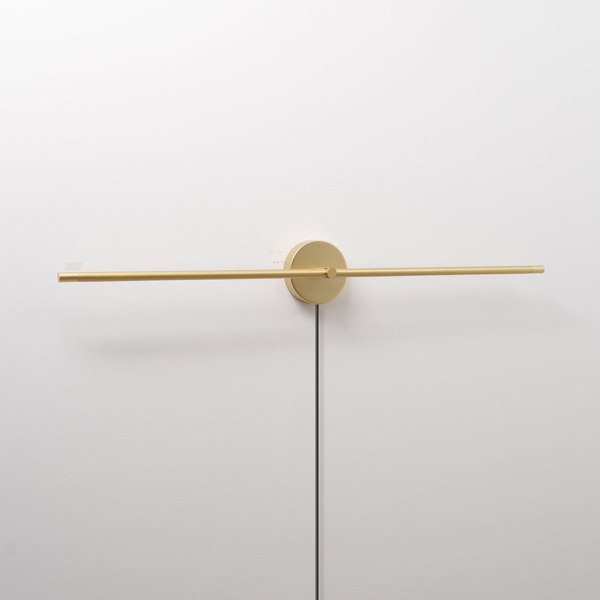 Linear LED Plug-In Wall Sconce with Metal Body and Warm Glow