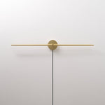 Linear LED Plug-In Wall Sconce with Metal Body and Warm Glow