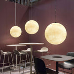 Moon Pendant Lamp – Celestial Resin Hanging Light for Modern Interiors