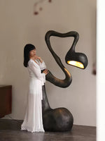 Myrrh Sculptural Floor Lamp in Matte Black with Gold Interior