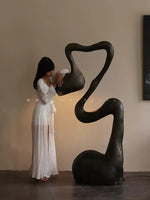 Myrrh Sculptural Floor Lamp in Matte Black with Gold Interior