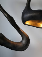 Myrrh Sculptural Floor Lamp in Matte Black with Gold Interior