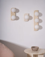 Elysian Travertine Wall Sconce with Glass Globes – Modern Natural Stone Lighting