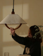 Nimbus Arc Pendant Light – Pleated Fabric Shade with Wood Accent