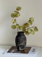 Noir Vein Stone Vase – Sculptural Marble Decor for Refined Interiors