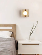 Nora Travertine Wall Sconce – Sculptural LED Wall Light in Natural Stone
