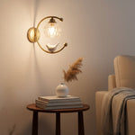 Nuvia Bird Wall Sconce in Brass and Glass | Designer Bedroom Lighting