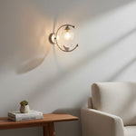 Nuvia Bird Wall Sconce in Brass and Glass | Designer Bedroom Lighting