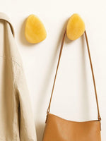 Amber Onyx Wall Coat Hook – Sculptural Marble Hook for Entryway and Living Spaces