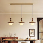 Orben Globe Pendant Light in Gold and Walnut with Opal Glass Shade