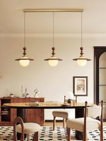 Orben Globe Pendant Light in Gold and Walnut with Opal Glass Shade