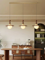 Orben Globe Pendant Light in Gold and Walnut with Opal Glass Shade