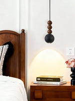 Orbio Sphere Pendant Light — Walnut & Black Travertine Ceiling Lamp
