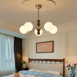 Orbital Curve Chandelier – Modern Walnut & Glass Pendant Light for Dining Room