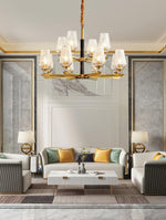 Orrefors Brass Chandelier with Faceted Glass Rings