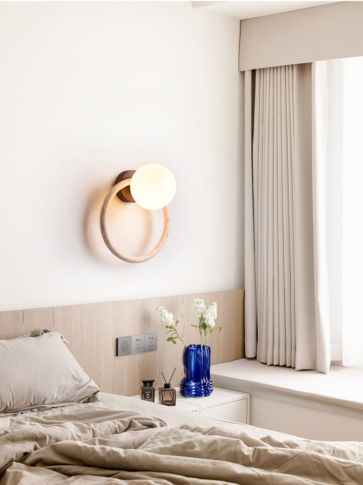 Orria Travertine Wall Sconce with Opaline Glass Globe