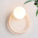Orria Travertine Wall Sconce with Opaline Glass Globe