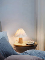 Pleara Sculpted Wood Table Lamp with Pleated Fabric Shade
