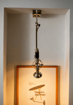 Precision Beam Adjustable Chrome Wall Sconce for Modern Interiors