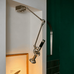 Precision Beam Adjustable Chrome Wall Sconce for Modern Interiors