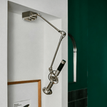 Precision Beam Adjustable Chrome Wall Sconce for Modern Interiors