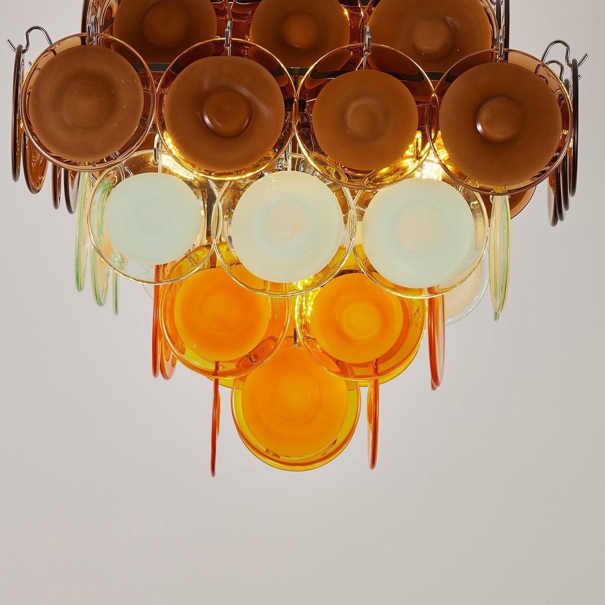 Layered Glass Disc Chandelier with Amber and Pastel Tones for Dining and Living Spaces