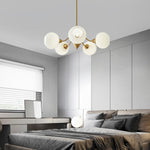 Ribbed Glass Globe Chandelier in Brass for Modern Interiors