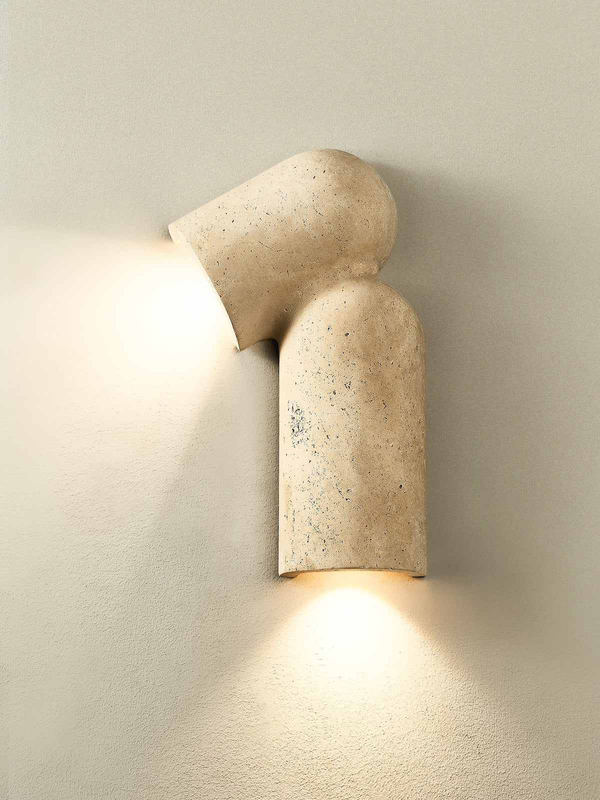 Selvian Sculptural Travertine Wall Sconce for Modern Interiors